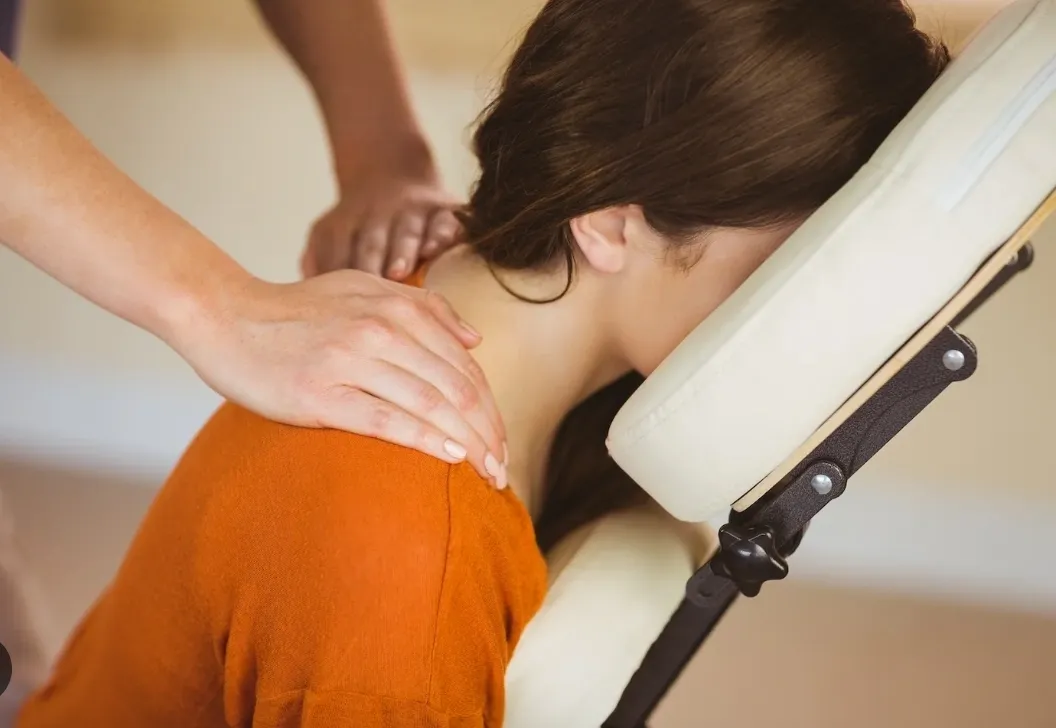 A relaxing shoulder massage in a treatment chair